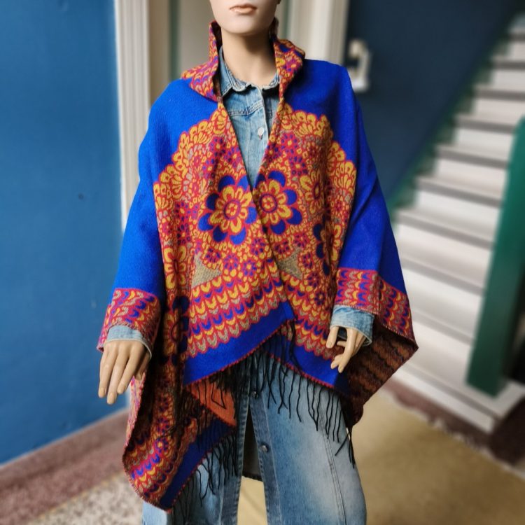 Poncho capuchon Nooitgedacht
